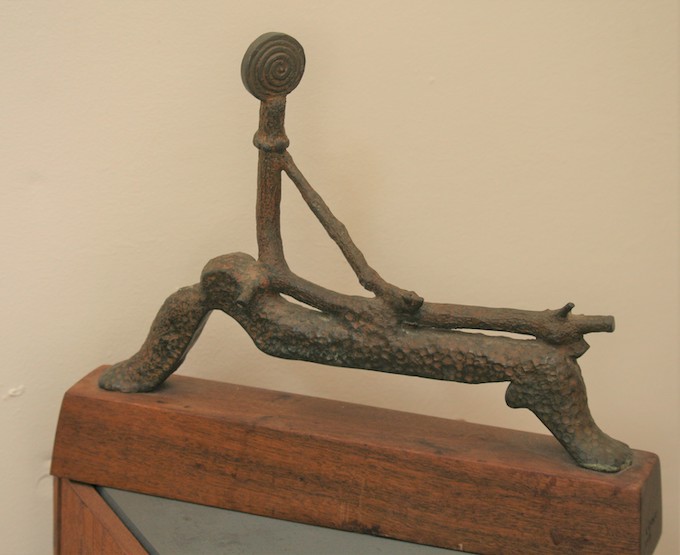 Awake and
Spinning (spiral atop a figure of a bed)